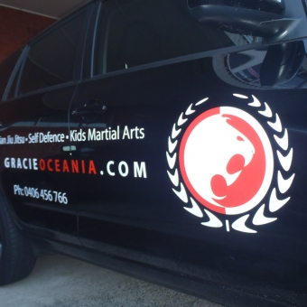 Vehicle wrapped with graphics